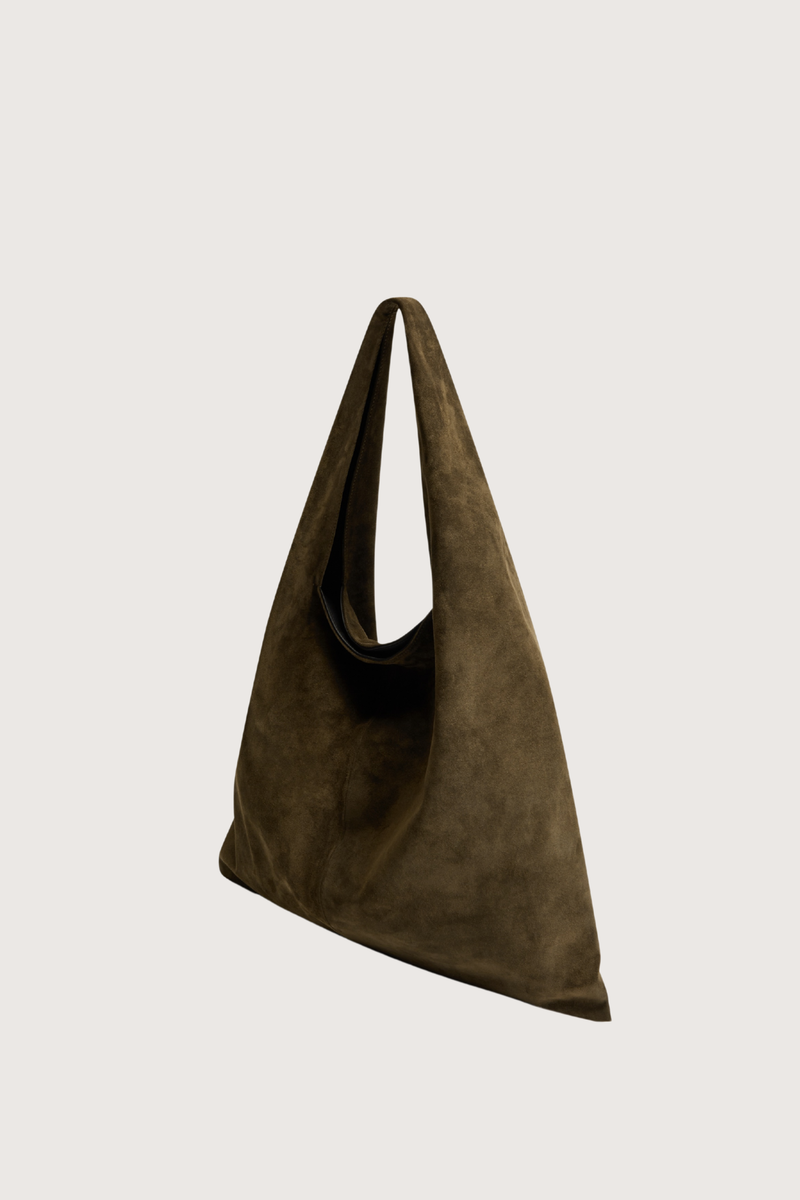 angled profile  East Tote Suede Bag padron deep brown Shoulder, or hand carry
Seamless sides
Triangular exterior silhouette
Rounded top
Flat base 
100% Calfskin Suede