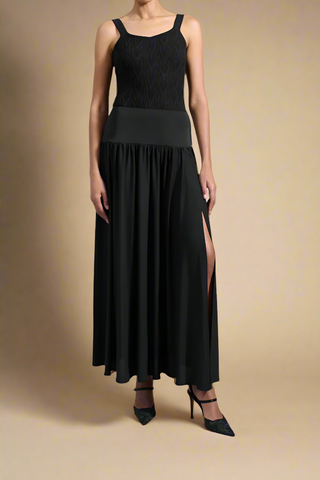 front profile model wearing Eavan Long Slinky Jersey Skirt dropped waist with high slit