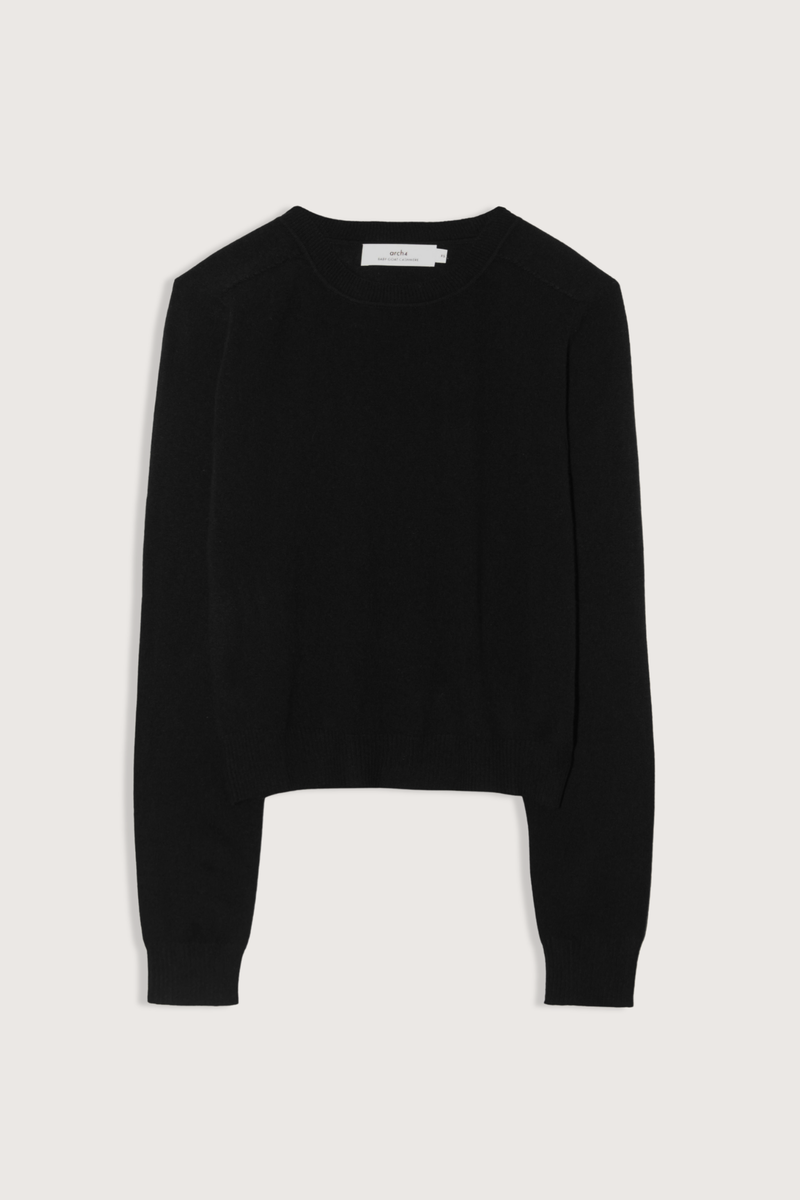 flat lay Elara Baby Coat Cashmere Pullover Black 100% baby goat cashmere
Knitted for an exceptionally soft, warm and breathable feel
Raglan sleeves
Contrast rib
Clean crew neck
Deep ribbed hem
