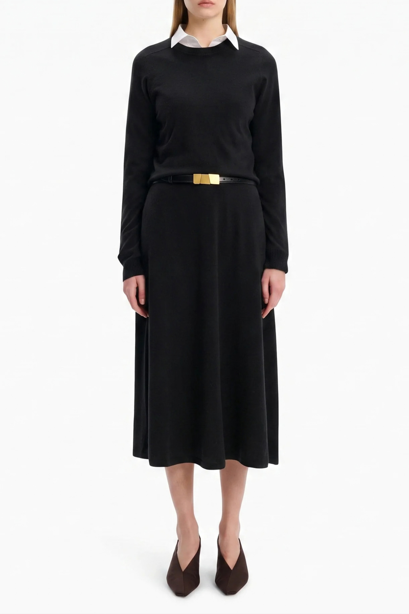 front profile model wearing Elara Baby Coat Cashmere Pullover Black 100% baby goat cashmere
Knitted for an exceptionally soft, warm and breathable feel
Raglan sleeves
Contrast rib
Clean crew neck
Deep ribbed hem