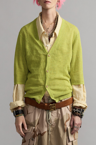 front profile model wearing 100% LINEN
V-neck
3/4 Sleeves
Ribbed cuff &amp; hem
Split hem
4 button front closure