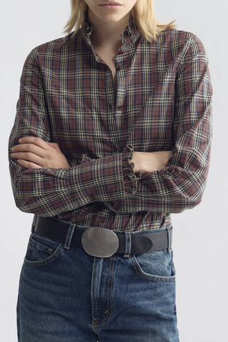 front profile model wearing  Elio Cotton Plaid Shirt rust  Classic fit
Ruffle detailing at the neckline and cuffs
Elongated tuxedo cuffs
Traditional tuxedo cuff construction
Center front placket
Troca shell buttons
100% Cotton