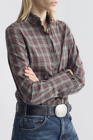 side profile model wearing  Elio Cotton Plaid Shirt rust  Classic fit
Ruffle detailing at the neckline and cuffs
Elongated tuxedo cuffs
Traditional tuxedo cuff construction
Center front placket
Troca shell buttons
100% Cotton