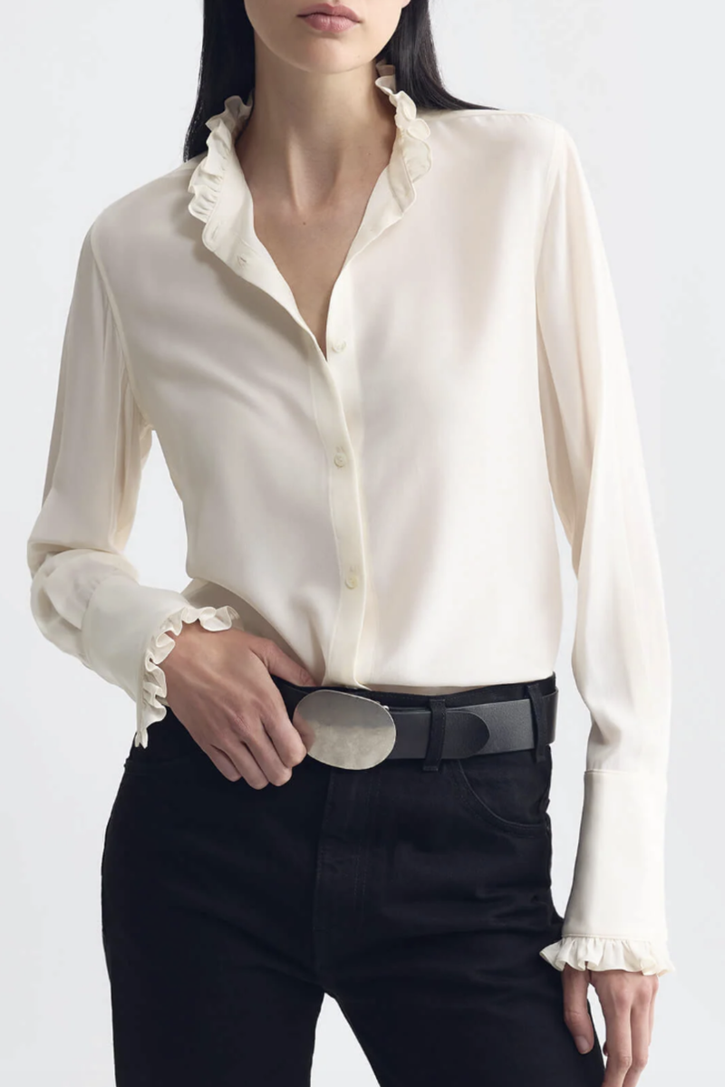 front profile model wearing Elio Ruffle Neck & Cuff Shirt ivory Classic fit tailored
Ruffle detailing at the neckline and cuffs
Traditional tuxedo cuff construction
Center front placket
Troca shell buttons
100% Silk
