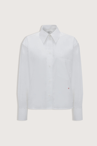 flat lay Ellys Shirt white Cropped length
Contrast red VB embroidery
Collared neckline
Chest pocket
100% Cotton