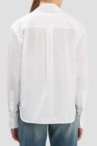 back profile model wearing  Ellys Shirt white Cropped length
Contrast red VB embroidery
Collared neckline
Chest pocket
100% Cotton