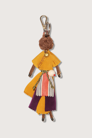 flat lay Emine Turkish Friend Key Ring charm Macramé of a doll design mustard and purple