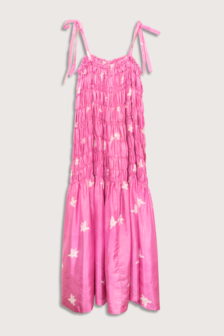 flat lay Emrys Pink Jasmin Silk Dress medium pink Cut from hand-loomed silk
Relaxed maxi dress
and Fluid drape
and Ruched tiers
Tie shoulder straps
Hand-block-printed
Asymmetrical jasmine motif