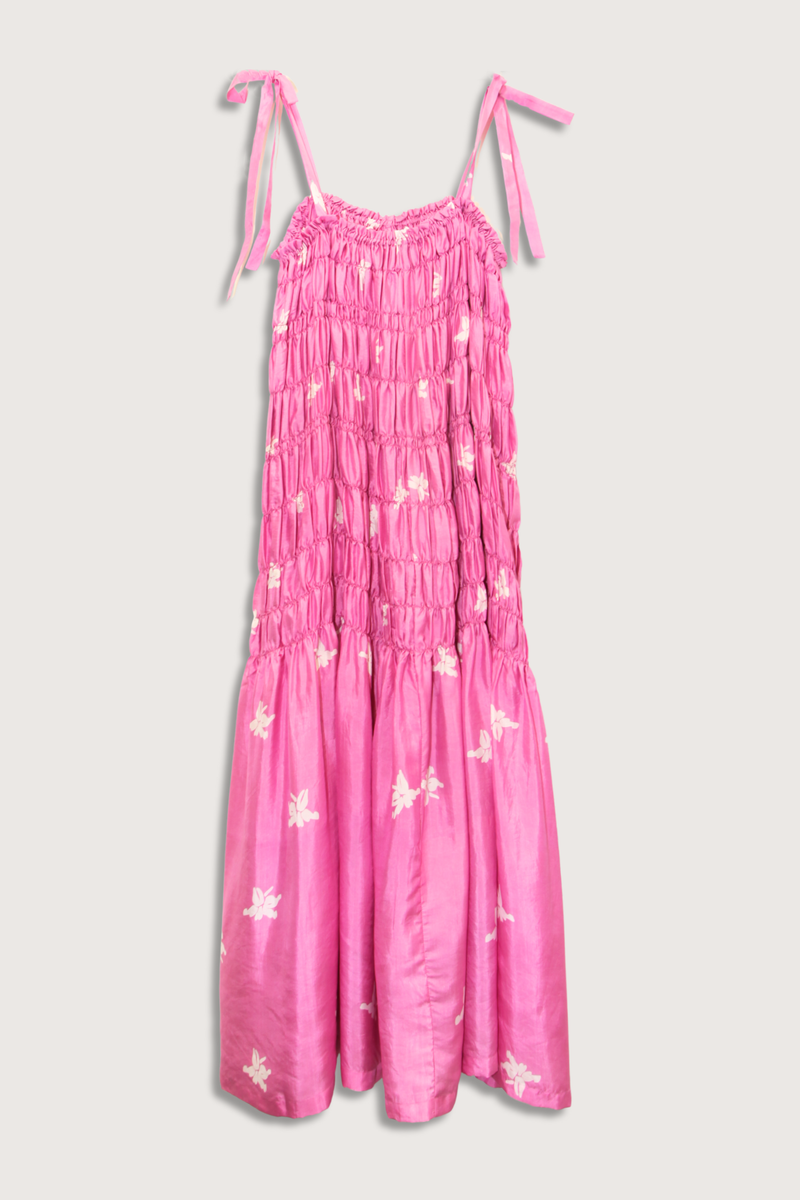 flat lay Emrys Pink Jasmin Silk Dress medium pink Cut from hand-loomed silk
Relaxed maxi dress
and Fluid drape
and Ruched tiers
Tie shoulder straps
Hand-block-printed
Asymmetrical jasmine motif
