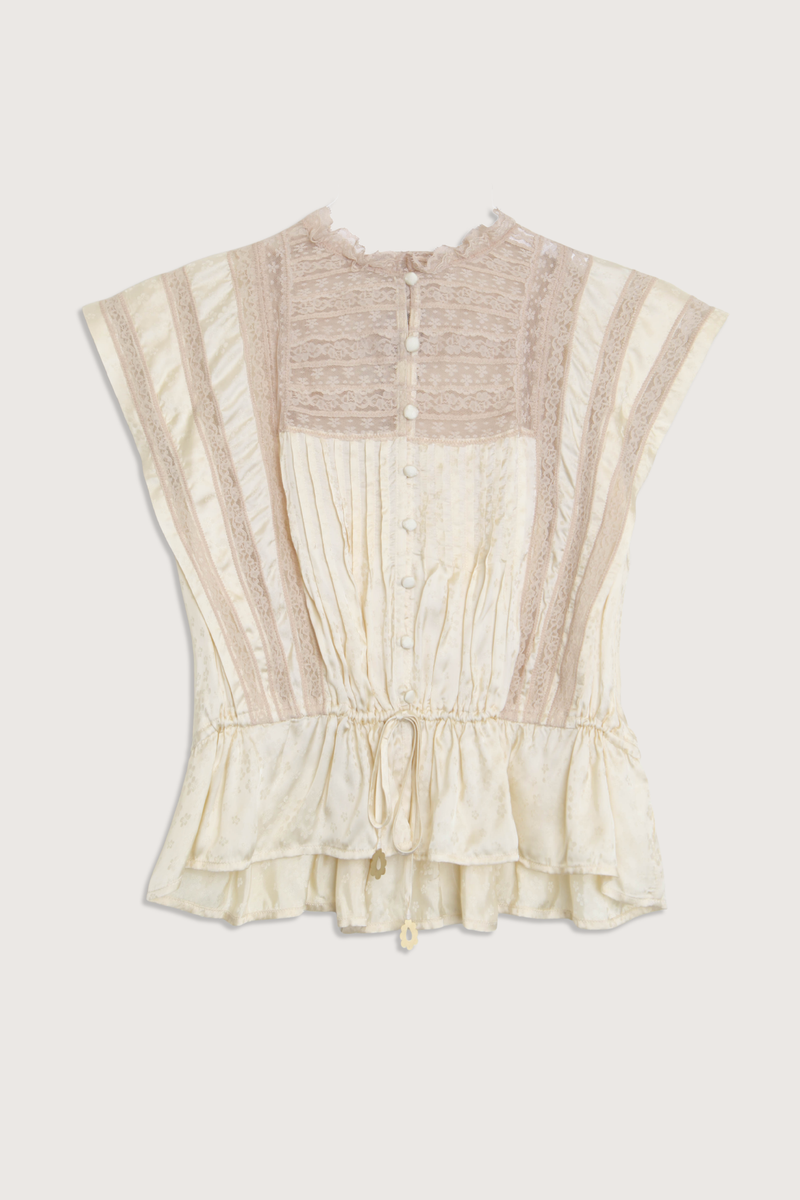 flat lay Ethel Top yellow Delicate floral motif
Lace inserts throughout
Adjustable drawstrings at the waist