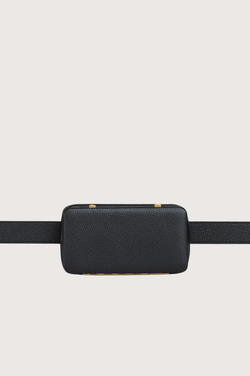 front profile Eva Brandon Cross Body & Belt Bag Signature frame construction with double latch closure
Adjustable and removable
Worn four ways: as a belt bag, as a cross-body bag, as a clutch (belt removed), or as a belt by itself
Lined in midnight ultrasuede
Two card slots for credit cards, cash or subway tickets
Fits most cell phones
Logo is gold-embossed on the back
Evan comes in Brandon, our signature LWG gold-rated pebbled calf leather