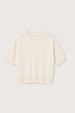 flat lay Evie Relaxed Short Sleeve Sweater Gardenia white
Cashmere knit
Relaxed body
Ribbed trim
100% Cashmere
12 Gauge, 1 Ply Cashmere Jersey Stitch
