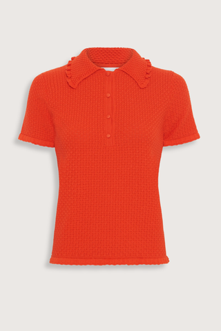 flat lay Extra Textured Polo blood orange Fine, textured knit
Luxurious cotton yarn
Honeycomb-knit collar
Waffled knit
Smocked ruffled trim
Small buttons on the front