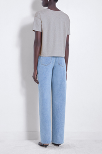 back profile model wearing FAAA V-Neck Tee Grey Melange supima cotton boxy fit