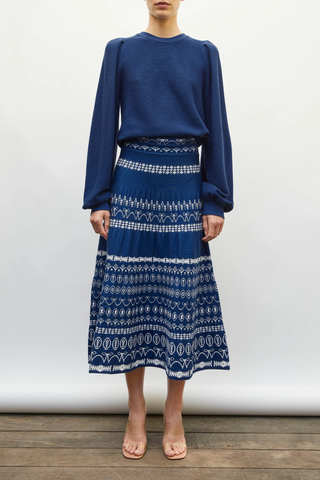 front profile model wearing Farandole Crew Top Royal Blue Fine, soft knit top
Gathered sleeves
Pleated effect
Fine Italian garter-stitch knit sweater
Straight cut
Round neckline
Long gathered sleeves 
100% pure extra-soft virgin wool