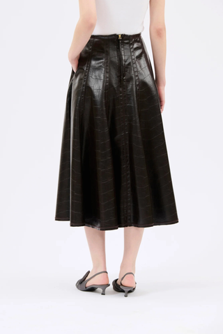 back profile model wearing Faux Croc Leather Skirt dark chocolate A-line
Maxi length
Side seams
Dcorative stitching
100% polyester
Center-back zipper
Pull tab