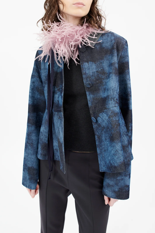 model wearing  Feather Collar Lily pink with ribbon tie