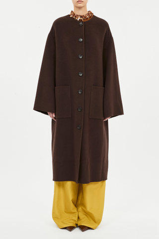 front profile model wearing Fernanda Double Faced Wool Oversized Coat with removable tie two front pockets collarless brown