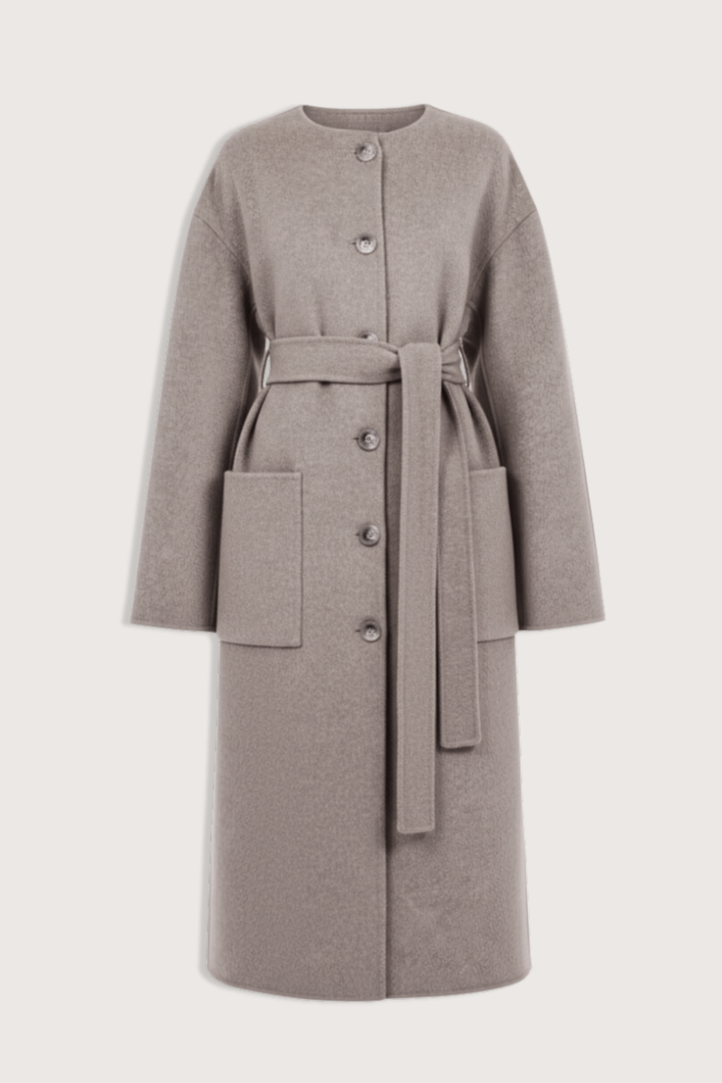 flat lay Fernanda Long Belted Coat dove grey melange Collarless silhouette coat
Patch pockets
Double-faced wool construction
95% wool, 5% cashmere
Self-belt
Button front
Long coat silhouette
Lightly nips at waist