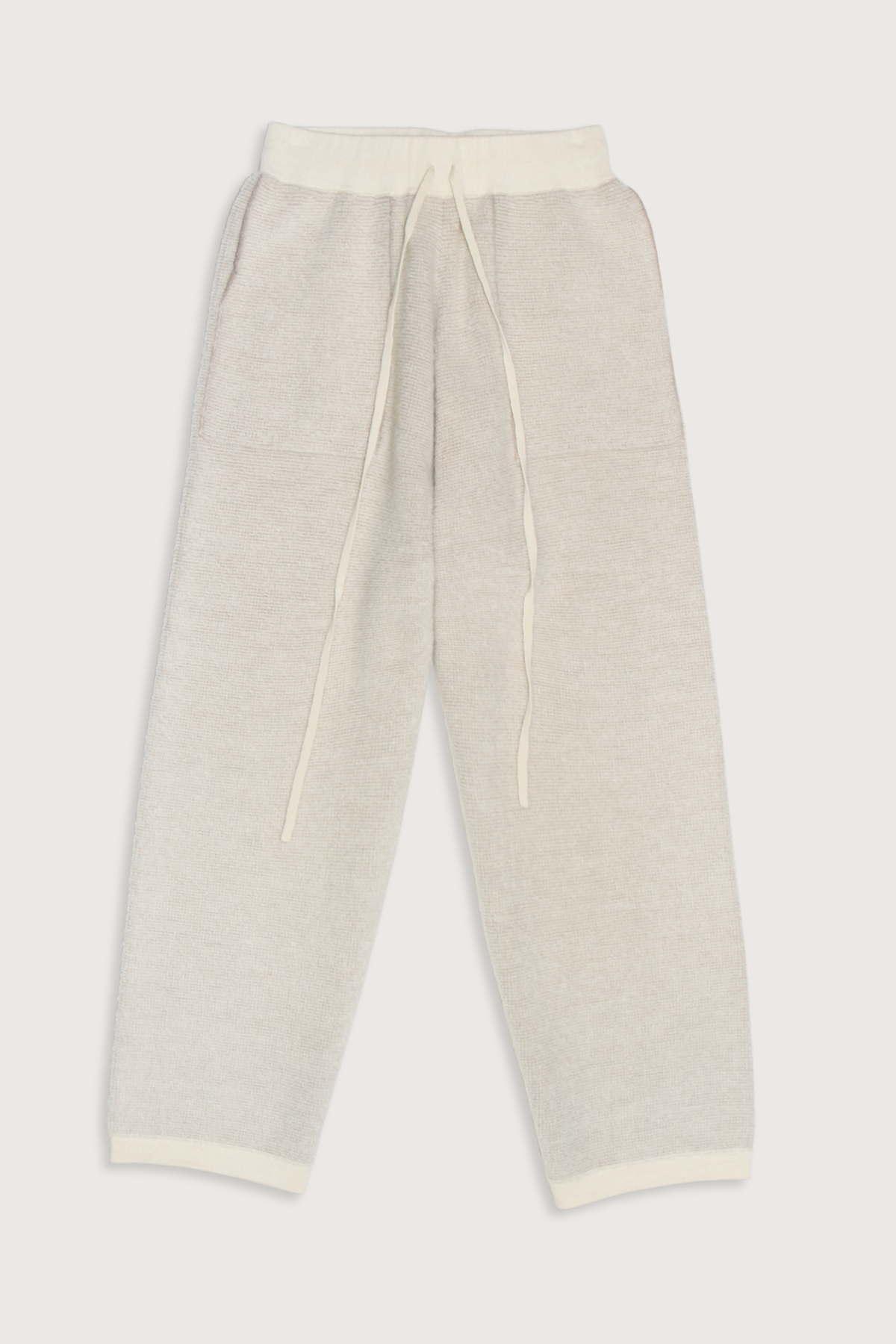 flat lay Fine Terry Trouser Adjustable waist tie
Cuffed at the bottom
Relaxed fit raw white