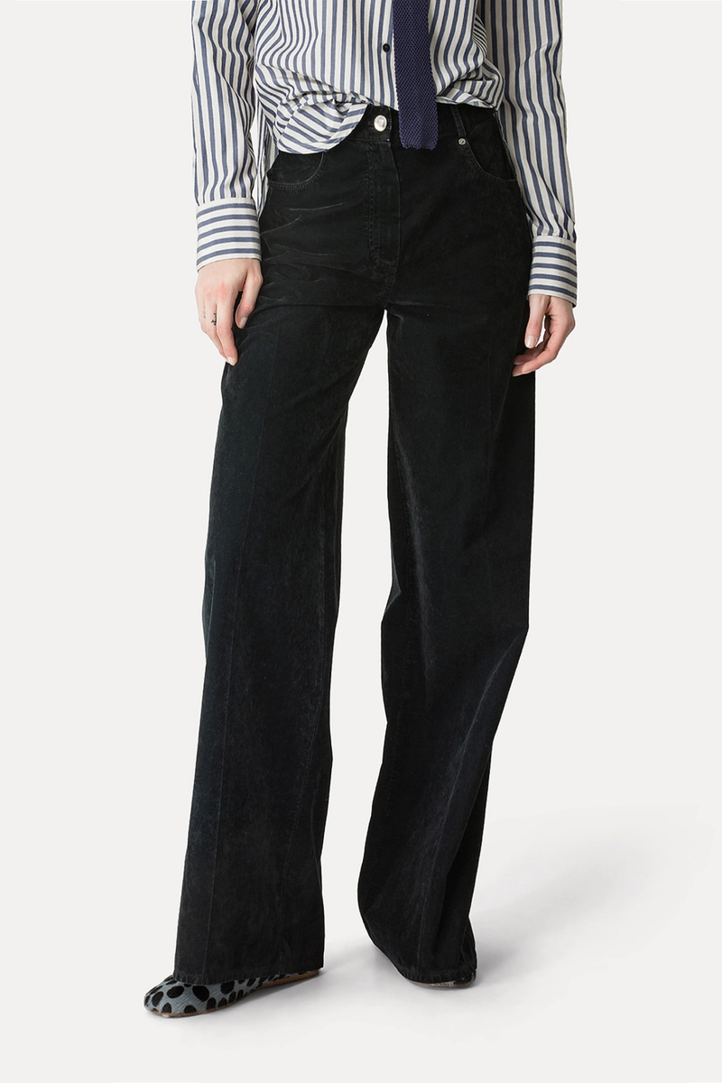 front profile model wearing Flocked Cotton Pants black 5–pocket trousers High–rise cut Wide leg Ironed crease