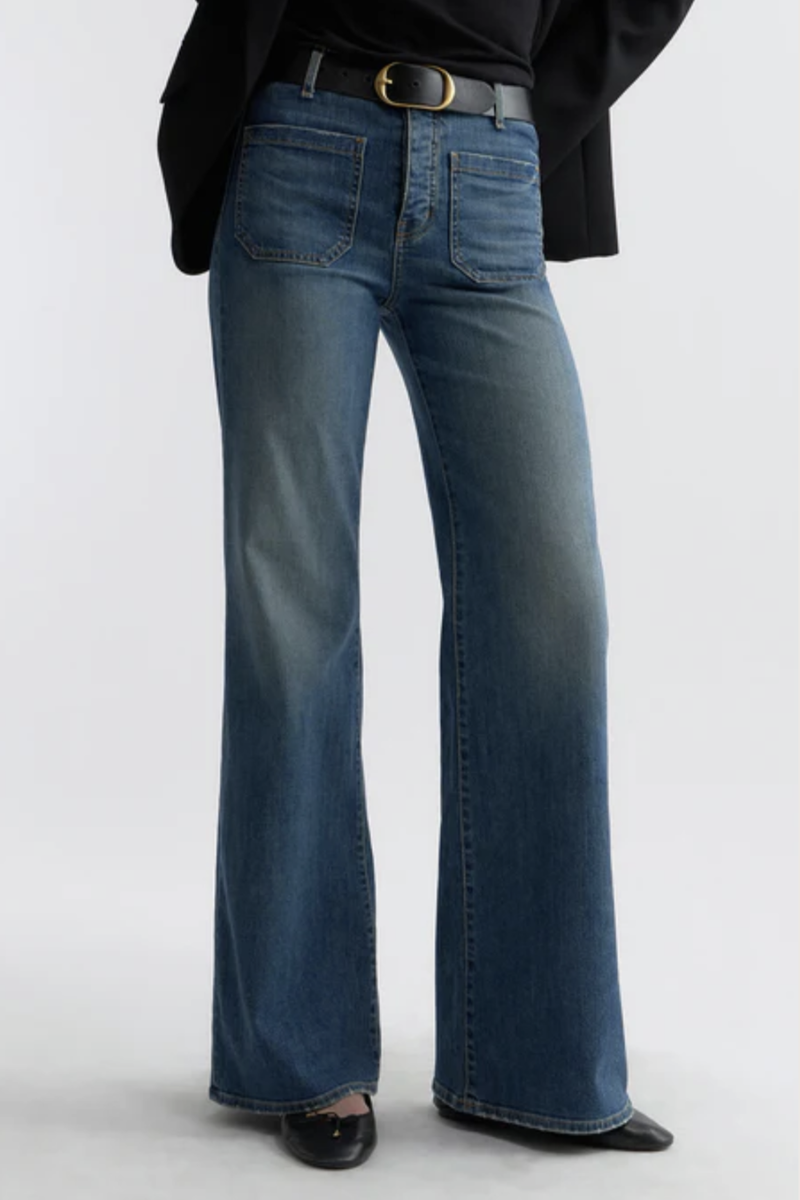 front profile model wearing Florence Jean Classic Wash mid blue Premium Japanese stretch denim
Utility design
Classic sailor pant
Mid-to-high-rise
Two flat front pockets
Flare leg