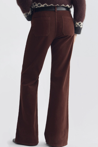 back profile model wearing Florence Moleskin Pant cabernet High-rise
Flare leg pant
Non-stretch Italian mid-weight moleskin
Fitted from waist through hip with a flared leg
Patch pockets at front and back
Zip fly
Branded shank closure
Belt loops at front and back
97% Cotton 3% Elastane