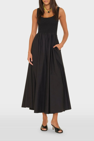 front profile model wearing Florence Tank Smock Dress black cotton Crisp paper poplin
Sleeveless midi sundress
Square neck
Smocked bodice
Side seam pockets