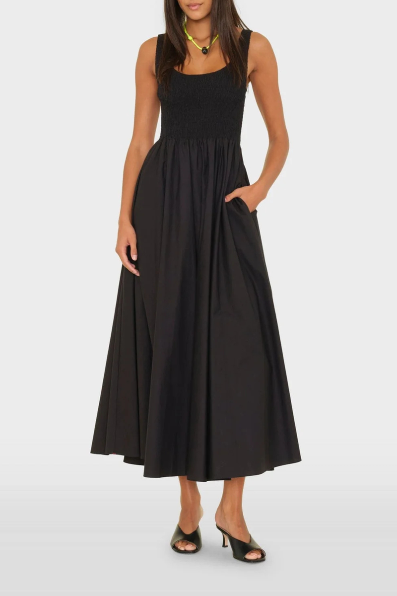 front profile model wearing Florence Tank Smock Dress black cotton Crisp paper poplin
Sleeveless midi sundress
Square neck
Smocked bodice
Side seam pockets