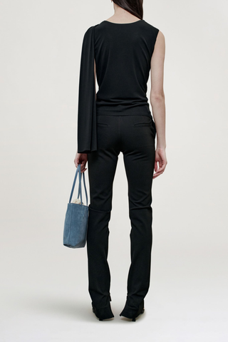back profile model wearing  Floriana Matte Jersey Top Sleeveless top
Slinky matte jersey
Diagonal ruching across the body from a high neckline
Fitted through the torso with a long sash at the shoulder
Light internal support at chest
100% Viscose