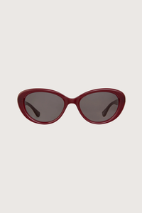 front profile GLCO x Doen Ingenue Sun Lipstick red frame  dark grey lens Thicker, more expressive cat-eye