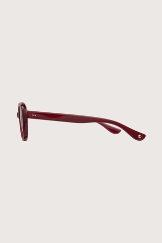 side profile GLCO x Doen Ingenue Sun Lipstick red frame  dark grey lens Thicker, more expressive cat-eye