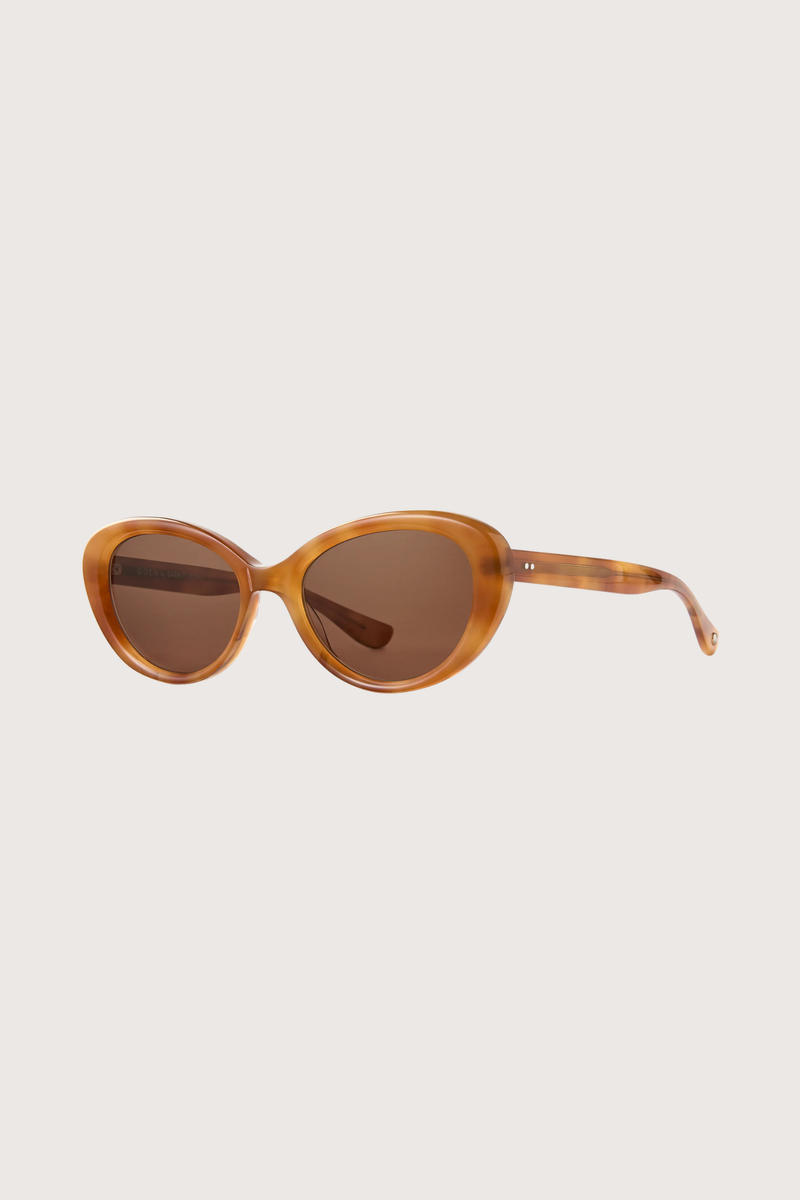 angled profile GLCO x Doen Ingenue Sun Tortoise caramel tortoiseshell frame with  light brown tint lens Thicker, more expressive cat-eye