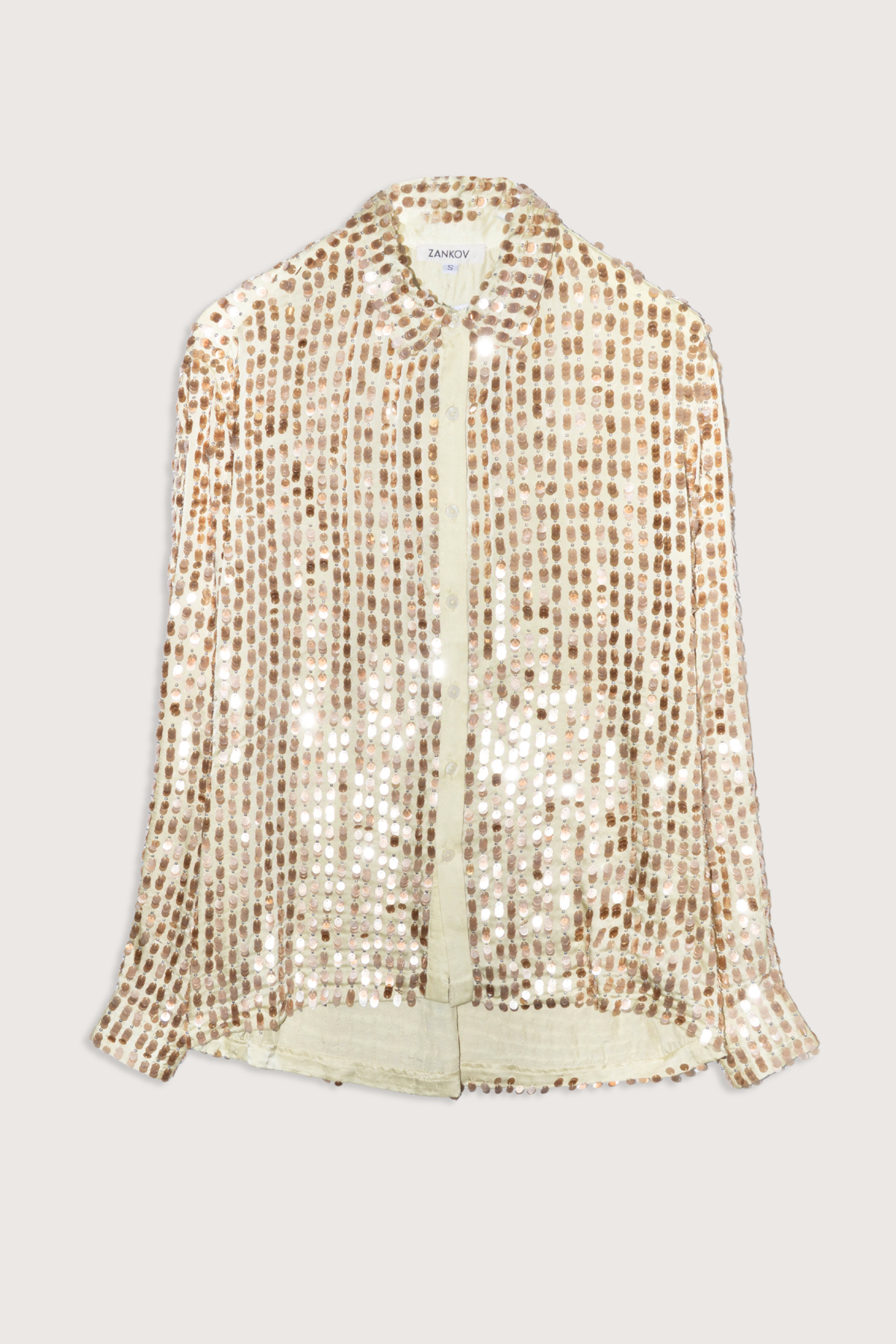 flat lay Gabriel Translucent Beaded Silk pear gold Long Sleeve
Micro pailettes throughout with beads
100% Silk&nbsp;
Button front closure