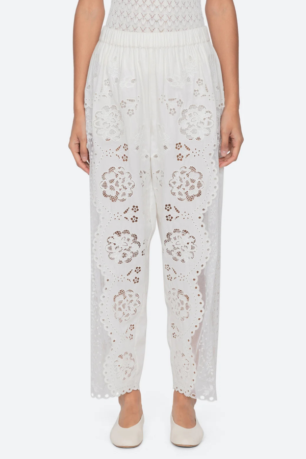 front profile model wearing Gardener Embroidered Pants white Floral embroidery throughout
Sheer side panels
Delicate cutout detailing
Elasticized waistband
Softly tapered silhouette cotton nylon polyester blend