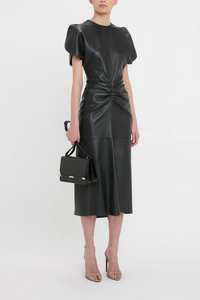 side profile model wearing Gathered Waist Midi black Dress lamb leather