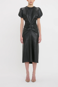 front profile model wearing Gathered Waist Midi black Dress lamb leather