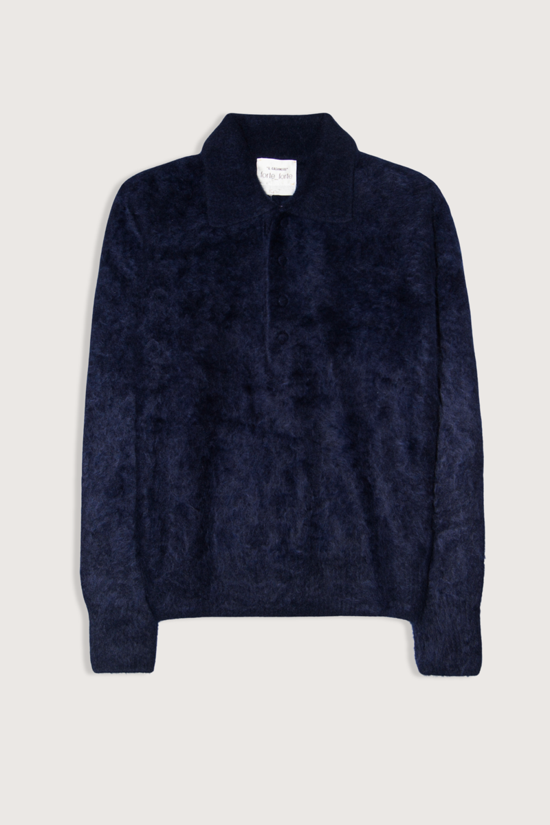 flat lay Gauzed Brushed Polo Night navy Brushed texture
Polo collar
Short front button fastening
Long sleeves
Ribbed cuffs &amp; hem

100% Cashmere