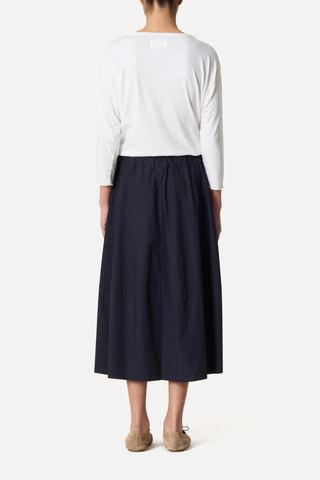 back profile model wearing Gea Skirt Atlantic Elasticated Waist
A-line skirt
Side seam pockets
Relaxed fit
Midi length
100% Cotton Poplin