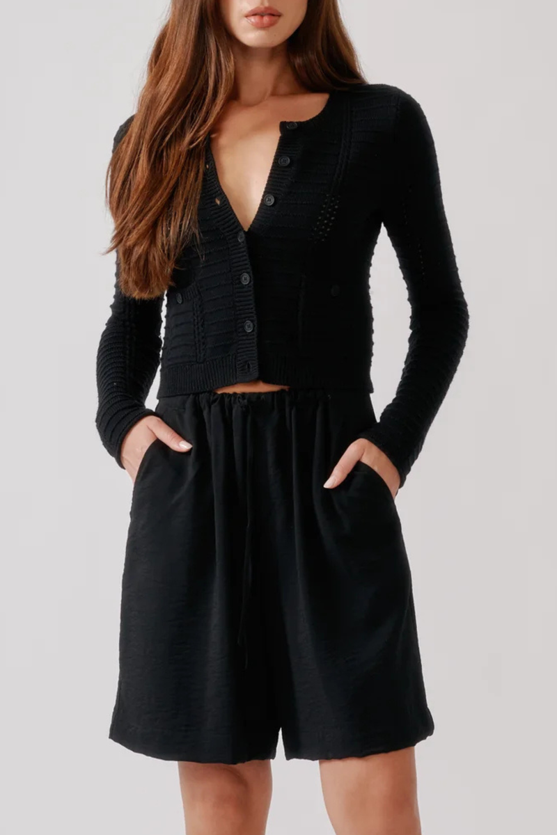 front profile model wearing Gemma Washed Short Black Longer-length short
Cinched waist
Relaxed silhouette