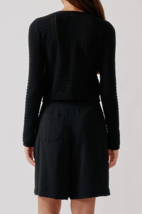 back profile model wearing Gemma Washed Short Black Longer-length short
Cinched waist
Relaxed silhouette