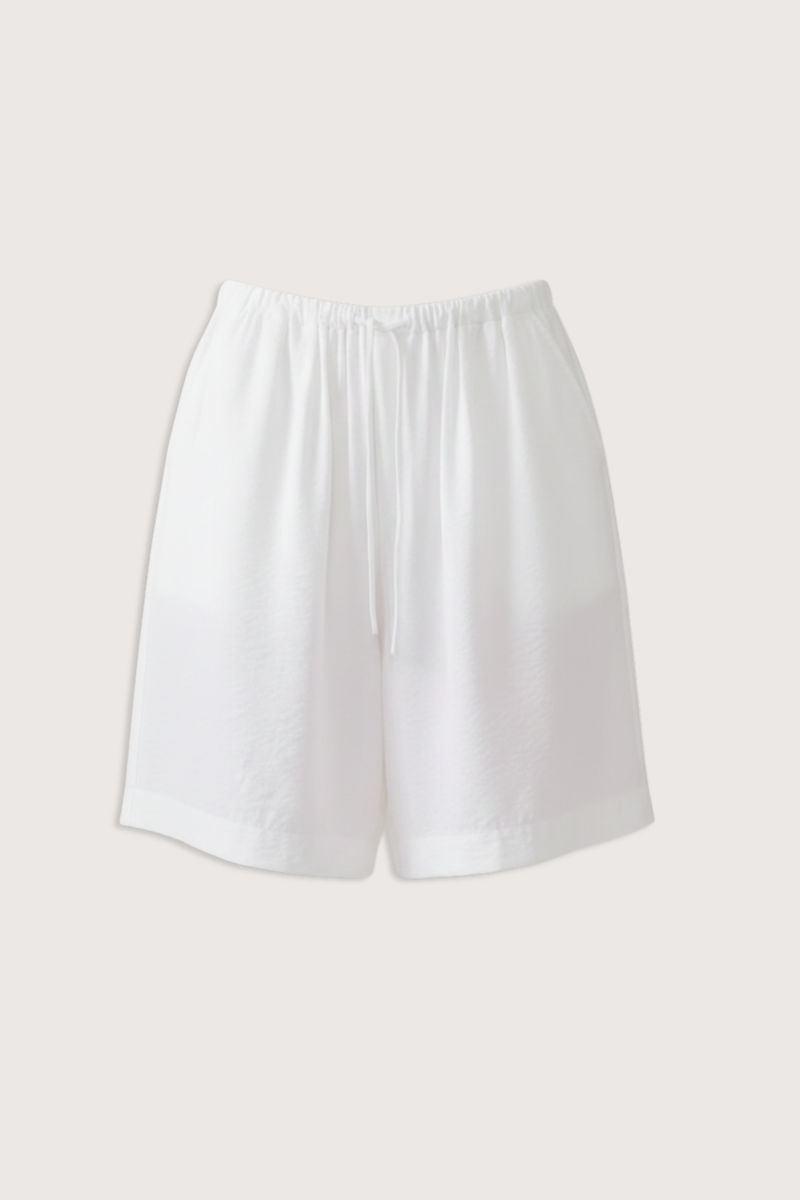 flat lay Gemma Washed Short White Longer-length short
Cinched waist
Relaxed silhouette
