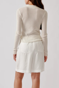 back profile model wearing Gemma Washed Short White Longer-length short
Cinched waist
Relaxed silhouette