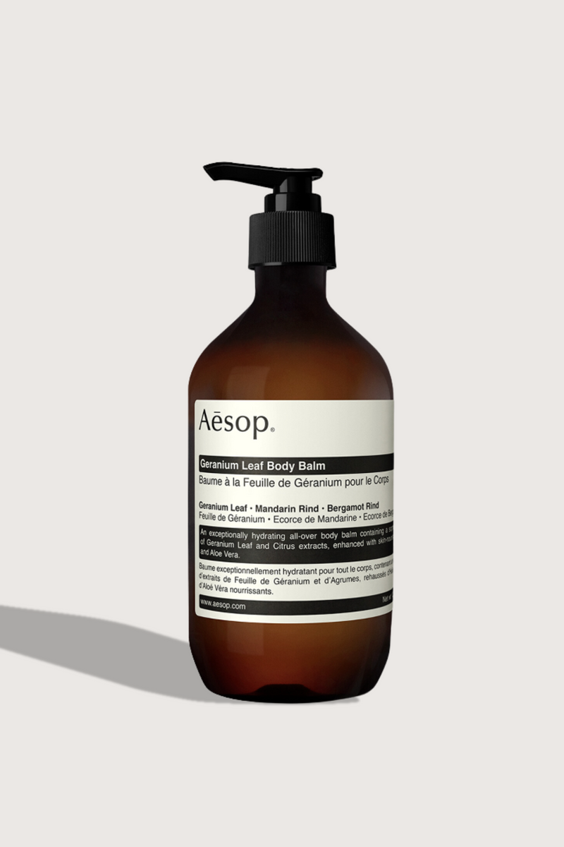 flat lay Geranium Leaf Body Balm 500mL brown bottle with pump