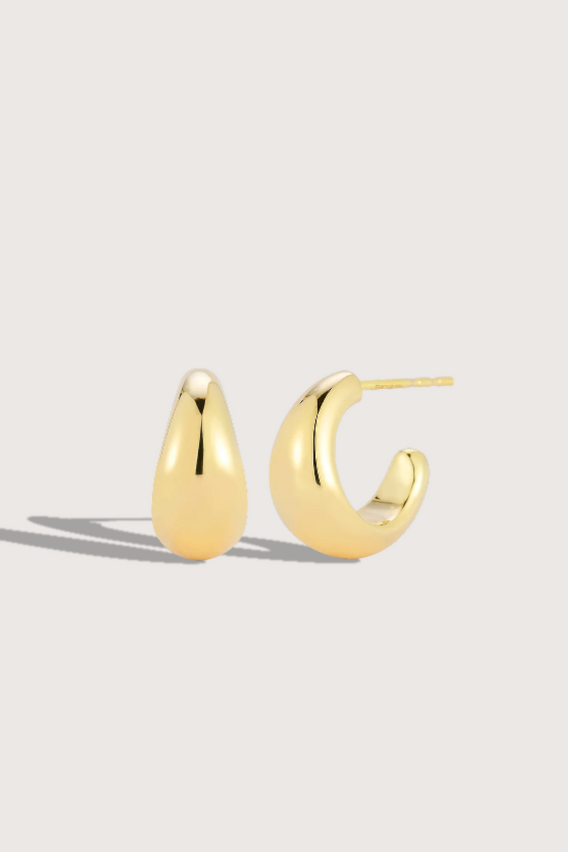 flat lay Gold Jumbo Dome HUGGIE Earring hollow 14k yellow gold