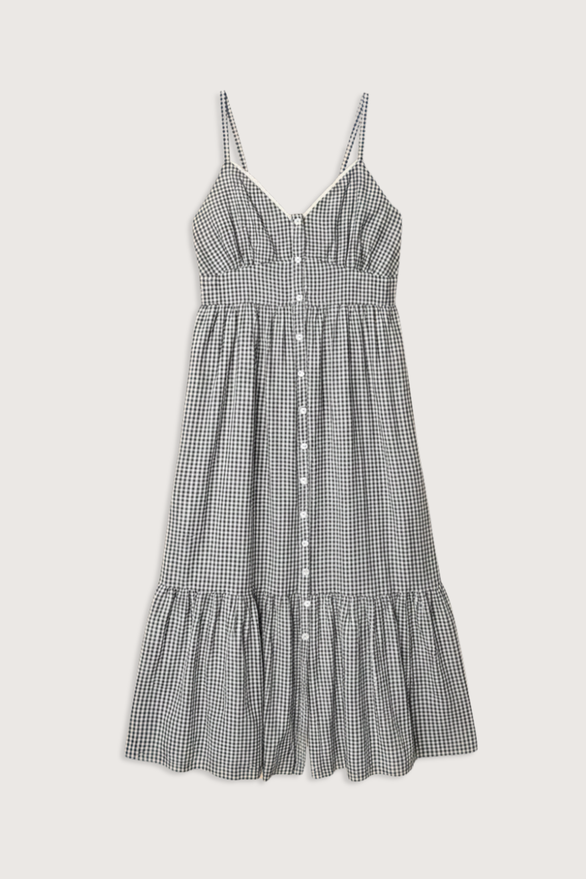 flat lay Greta Gingham Dress black sand cotton Balboa Gingham Mini Check
Button-front
Midi dress
V-neck
Adjustable straps
Fitted bodice
Tiered skirt
Side seam pockets
Smocked back
