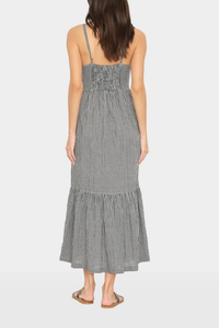 back profile model wearing Greta Gingham Dress black sand cotton Balboa Gingham Mini Check
Button-front
Midi dress
V-neck
Adjustable straps
Fitted bodice
Tiered skirt
Side seam pockets
Smocked back