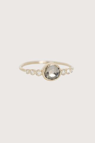 flat lay Grey Tourmaline & Diamond Ring 14k light yellow gold
One central grey tourmaline
Six diamonds