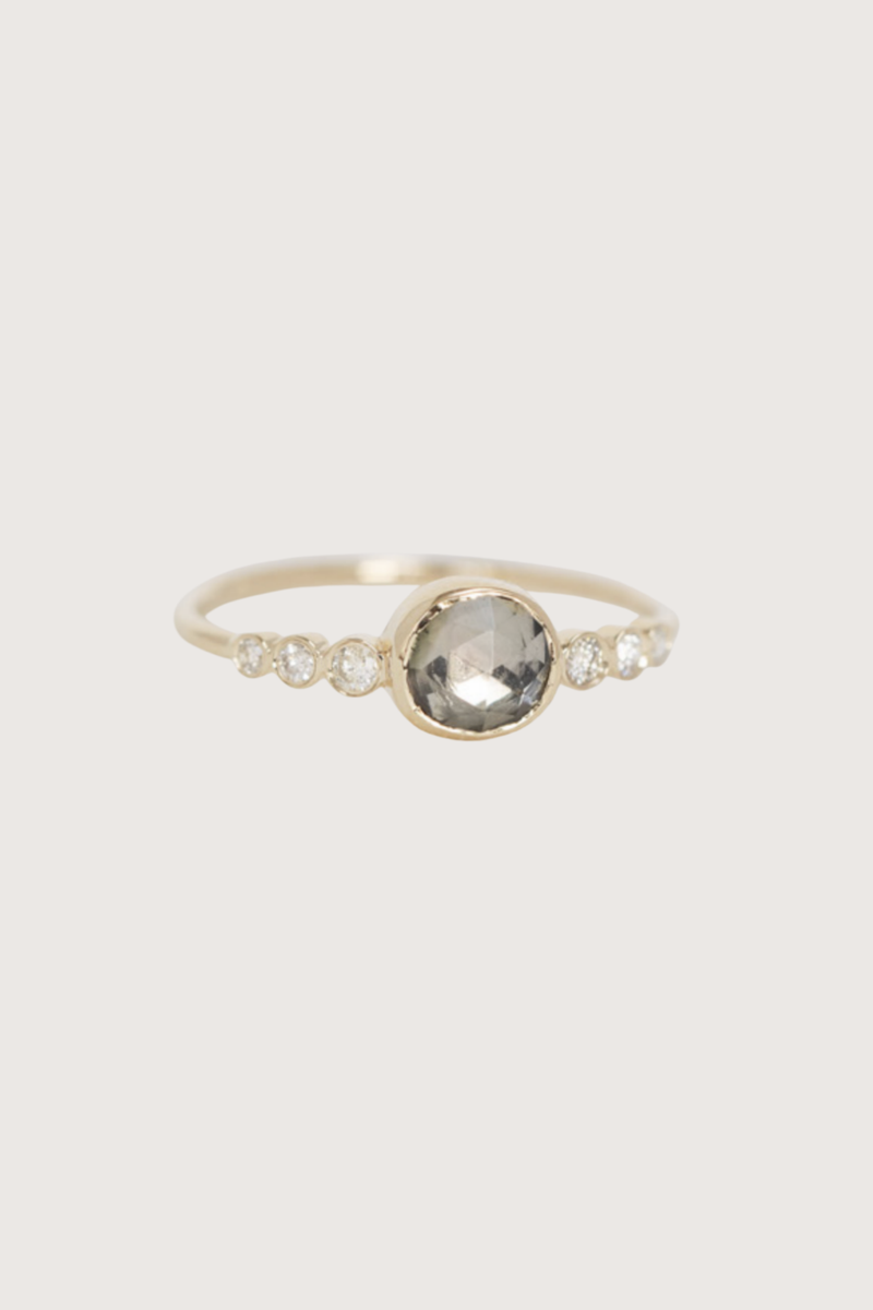 flat lay Grey Tourmaline & Diamond Ring 14k light yellow gold
One central grey tourmaline
Six diamonds