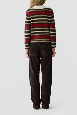 back profile model wearing Grizzly Cropped Rugby Polo carmine reg camel brown stripe combo  Rugby style
Knit from light-weight 100% cashmere
Cropped fit
Light-weight grizzly
Rib polo collar
Three button hidden half placket
Rib cuffs
